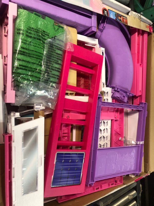 Photo 2 of Barbie Dreamhouse, Doll House Playset with 70+ Accessories Including Transforming Furniture, Elevator, Slide, Lights & Sounds Wheelchair Accessible Elevator