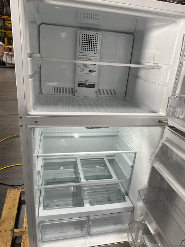 Photo 4 of GE Garage-ready 21.9-cu ft Top-Freezer Refrigerator (White)

