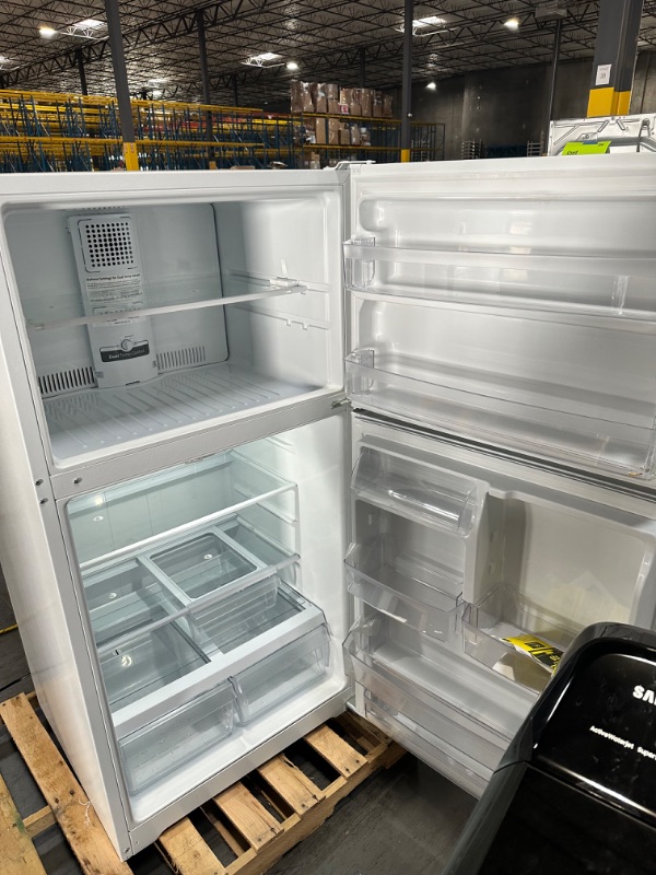 Photo 9 of GE Garage-ready 21.9-cu ft Top-Freezer Refrigerator (White)
