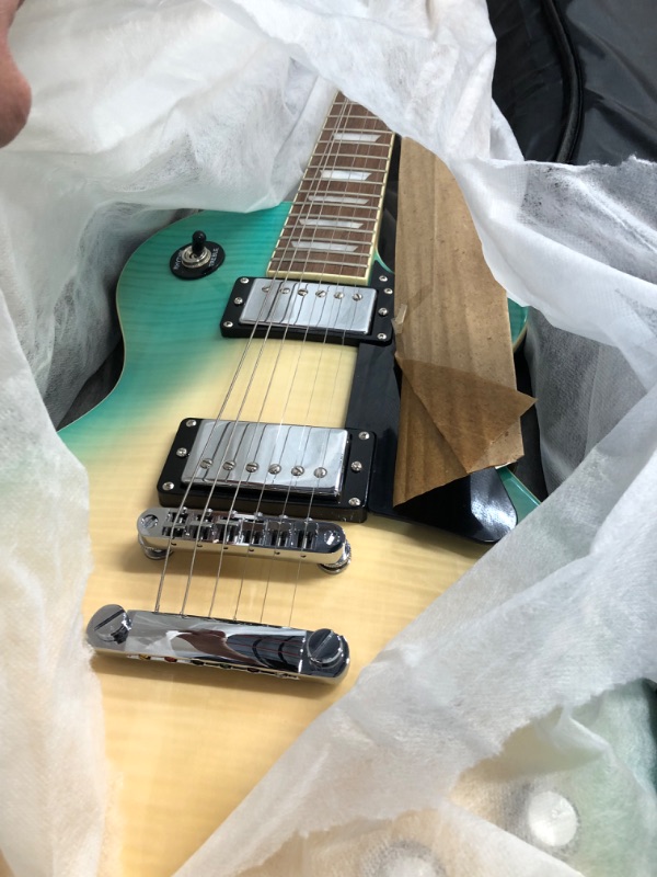 Photo 2 of Leo Jaymz 39” Electric Guitar Les Paul Style - Mahogany Body and Neck - Curved top Exquisite Flame Maple Veneer - Newly upgraded Alnico V Pickups, Powerful and Pure (Blue Burst)