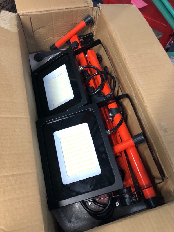 Photo 1 of *USED POSSIBLY MISSING PARTS* LEDMO Led Work Light with Tripod Stand 20000LM 200W 5000K IP65 Waterproof Adjustable Light Angle Portable Led Flood Light with 76.8in Metal Telescoping Tripod for Warehouse, Yard, Workshop
