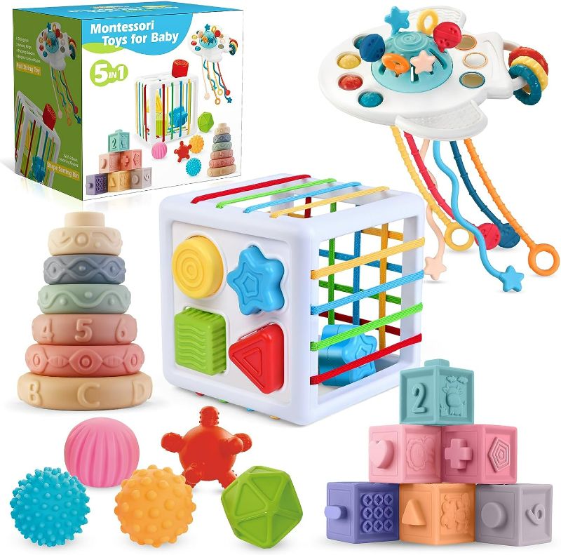 Photo 1 of 5 in 1 Montessori Toys for Babies 0-3-6-12 Months, Soft Baby Teething Toys, Sensory Bin Toy, Stacking Building Blocks & Rings for Infants,Developmental Toys for Toddler,Gift for Baby 12-18 Months
