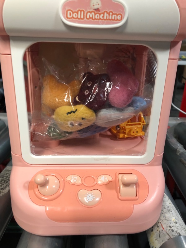 Photo 4 of *USED - SEE NOTES* Rabbit Claw Machine for Kids with Plush Toys, Gashapons, Plastic Toys, Dispenser Toys Mini Vending Machine with Music, Mini Claw Machine Crane Game Toys Candy Machine for 3-6,4-8,8-12 Girls and Boys
