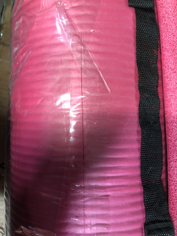 Photo 1 of **MINOR DAMAGE*SHALOW SLICE FROM BOXCUTTER DURING PREVIOUS OPENING*PICTURED**
The Hensley 1-Inch Yoga Mat - Pink