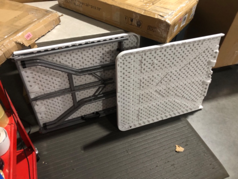 Photo 2 of ***MAJOR DAMAGE - NOT FUNCTIONAL - FOR PARTS - NONREFUNDABLE - SEE COMMENTS***
AM The America Store - Plastic Folding Table, Indoor Outdoor Heavy Duty Portable w/Handle 6FT White