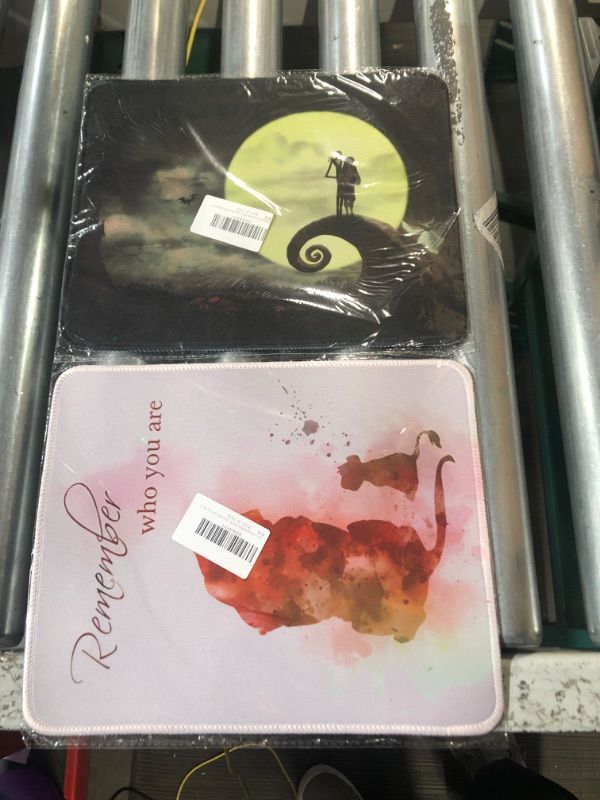 Photo 1 of **NON REFUNDABLE PACK OF 2** Disney mouse pads (Lion king and nightmare before Christmas)