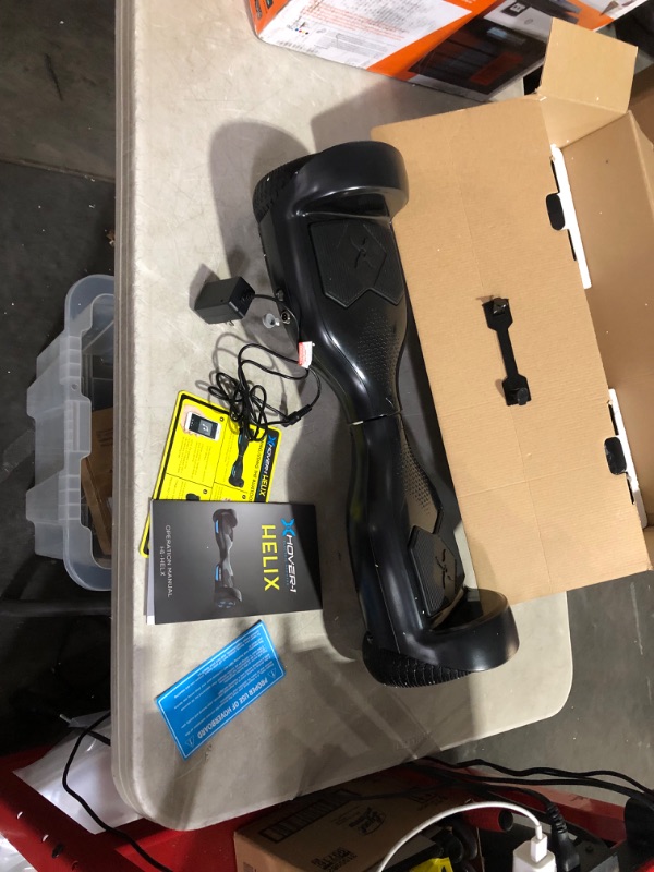 Photo 5 of ***NONREFUNDABLE - NOT FUNCTIONAL - FOR PARTS ONLY - SEE COMMENTS***
Hover-1 Helix Electric Hoverboard | 7MPH Top Speed, 4 Mile Range, 6HR Full-Charge, Built-in Bluetooth Speaker, Rider Modes: Beginner to Expert Hoverboard Black