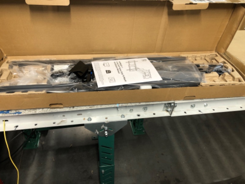Photo 1 of HCMOUNTING Heavy Duty Long Dual Arm TV Wall Mount Holds up to 179 lbs, Swivel and Tilt TV Mount with 40.9" Extended Articulating Arms for Most 42-90 inch TVs, VESA 800x400mm, Fits 16''-18'' Wood Studs
