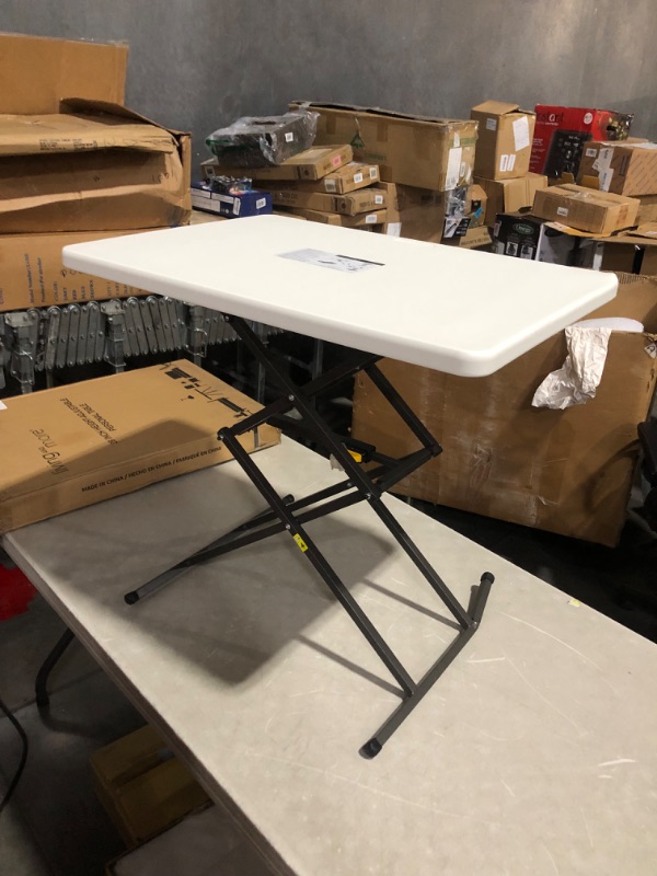 Photo 6 of ***DAMAGED - LEG BENT - WOBBLY - SEE PICTURES***
Living and More 28inch Height-Adjustable Personal Table, TV Tray, Portable Dinner Table, White