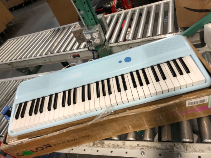 Photo 2 of **USED BUT APPEARS NEW**  The ONE Smart Keyboard COLOR 61 Keys Piano Keyboard, Music Keyboard with 256 Timbres, 64 Polyphony, 2 Speakers, Built-in LED Lights and Free Apps (Blue)