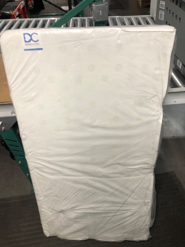 Photo 1 of Delta Children Twinkle Stars Breathable Baby Bed Crib Mattress and Toddler Mattress with Removable/Machine Washable Cover