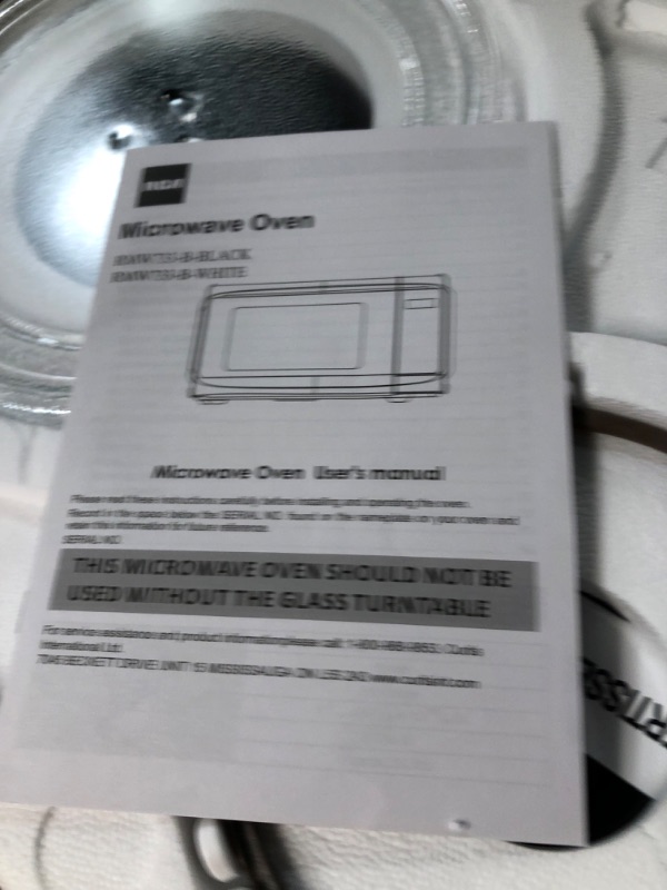 Photo 4 of **NON FUNCTIONAL*FOR PARTS**
RCA RMW733-BLACK RMW733 0.7 Cu. Ft. Microwave, Black Black 0.7