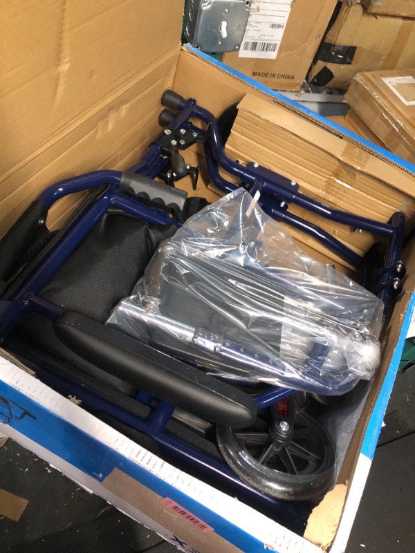Photo 1 of Carex Transport Wheelchair With 19 inch Seat - Folding Transport Chair with Foot Rests - Foldable Wheel Chair for Travel and Storage, 1 Count