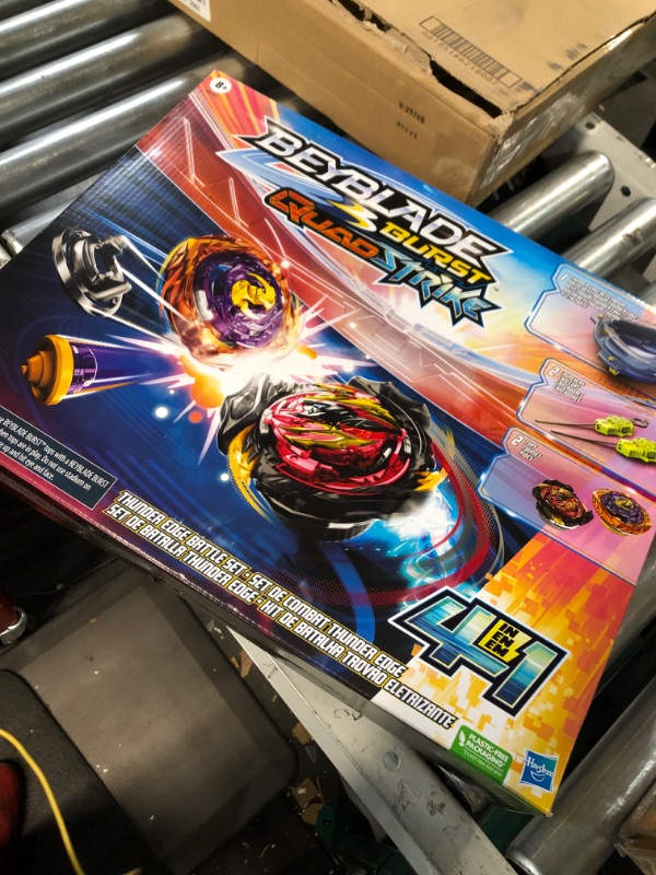 Photo 3 of Beyblade Burst QuadStrike Thunder Edge Battle Set, Battle Game Set with Beystadium, 2 Spinning Top Toys, and 2 Launchers for Ages 8 and Up