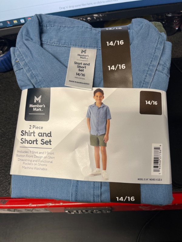 Photo 1 of BOYS SHIRT AND SHORT SET SIZE 14/16