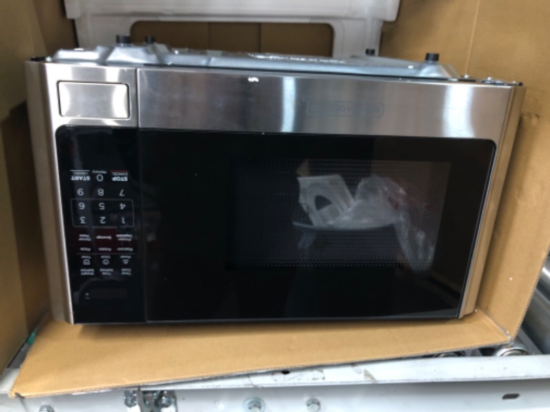 Photo 2 of **SEE NOTES/NON-REFUNDABLE FOR PARTS**
BLACK+DECKER Digital Microwave Oven with Turntable Push-Button Door, Child Safety Lock, Stainless Steel, 0.9 Cu Ft 0.9 Cu.ft