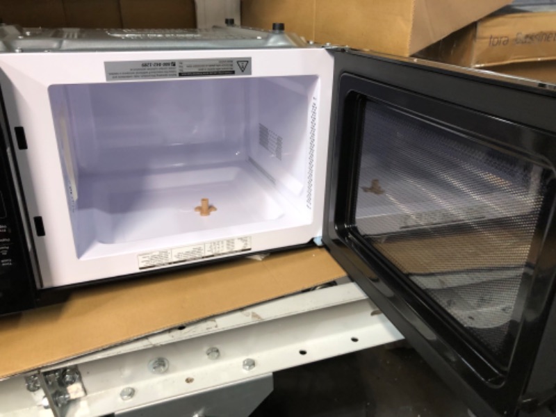 Photo 1 of **SEE NOTES/NON-REFUNDABLE FOR PARTS**
BLACK+DECKER Digital Microwave Oven with Turntable Push-Button Door, Child Safety Lock, Stainless Steel, 0.9 Cu Ft 0.9 Cu.ft