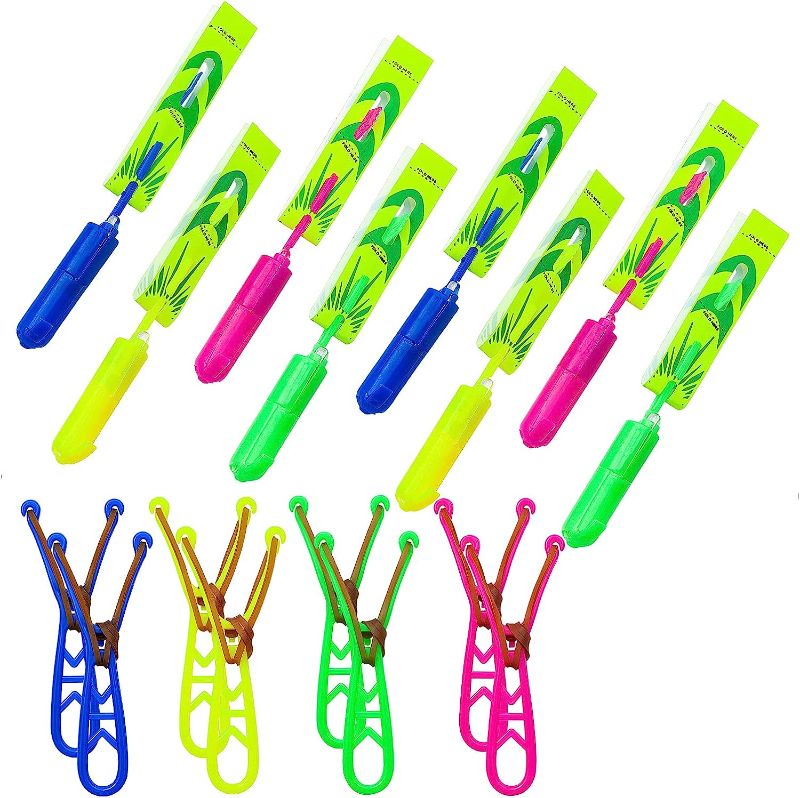 Photo 1 of Slingshot Flying with LED Lights Glow The Dark Party,10 Launchers + 10 LED Helicopters,Slingshot Amazing Arrow Helicopter Glow Supplies for Kids 