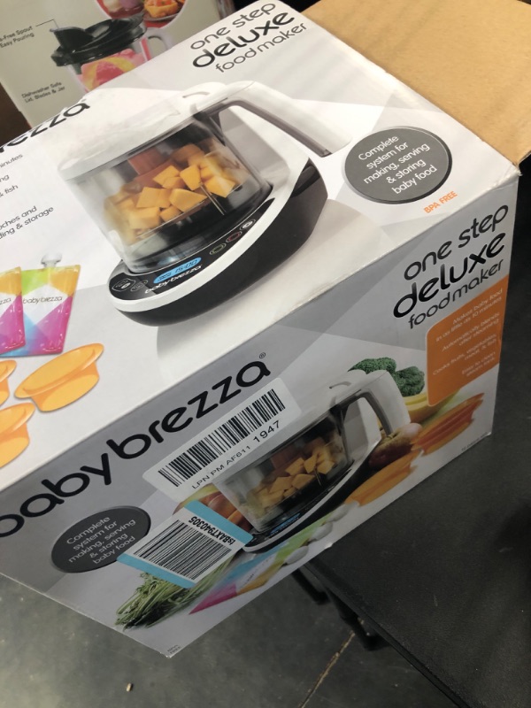 Photo 1 of Baby Brezza One Step Baby Food Maker Deluxe – Cooker and Blender in One to Steam and Puree Baby Food for Pouches - Make Organic Food for Infants and Toddlers - Set Includes 3 Pouches and 3 Funnels