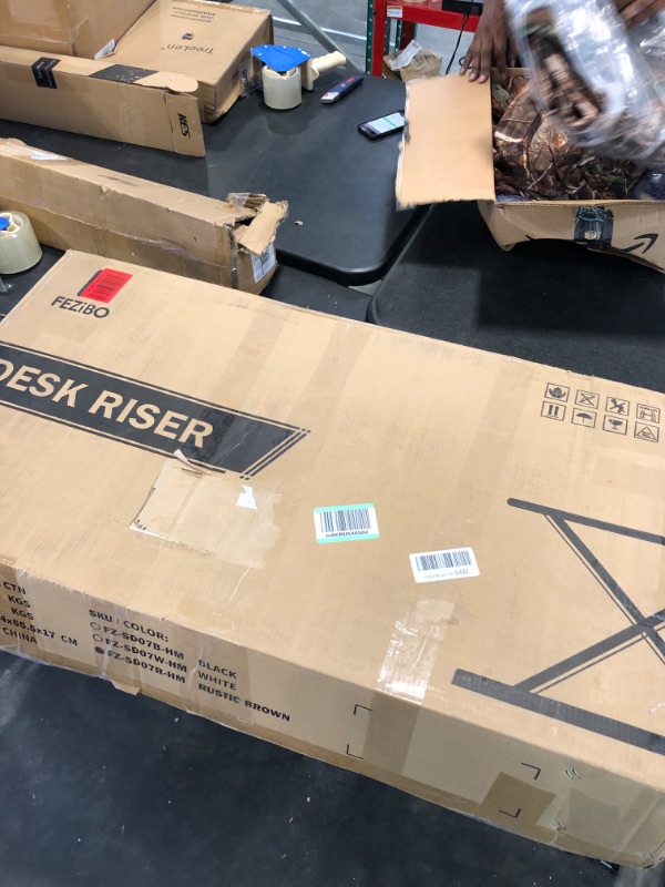 Photo 2 of FEZIBO Standing Desk with Height Adjustable 37 Inches Standing Desk Converter Stand up Riser Tabletop Workstation Fits Dual Monitor Rustic Brown 37 Inch Rustic Brown