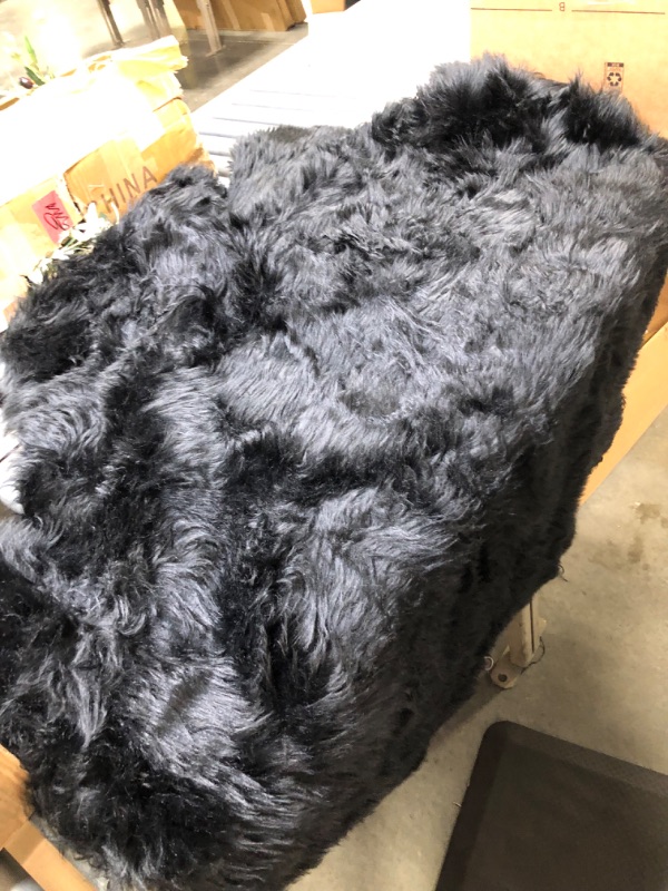 Photo 2 of AbunHeri Faux Black Bear Rug Faux Cowhide Rug Animal Print Area Rug Faux Sheepskin Fur Rug Decor for Living Room (5.1x6.1 Feet) Black 5.1x6.1 Feet