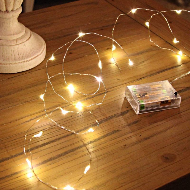 Photo 1 of Ariceleo Led Fairy Lights Battery Operated, 1 Pack Mini Battery Powered Copper Wire Starry Fairy Lights for Bedroom, Christmas, Parties, Wedding, Centerpiece, Decoration (5m/16ft Warm White)