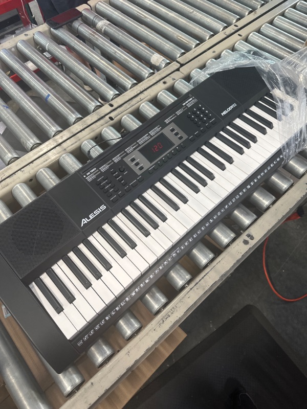 Photo 1 of Alesis Melody 61 Key Keyboard Piano for Beginners with Speakers, Stand, Bench, Headphones, Microphone, Sheet Music Stand, 300 Sounds and Music Lessons