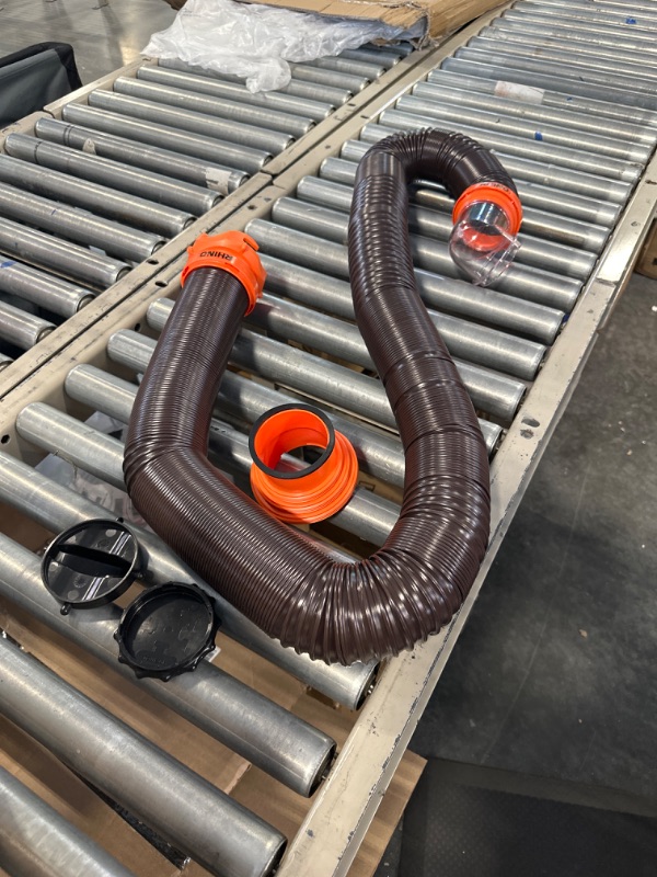 Photo 4 of Camco RhinoFLEX RV Sewer Hose Kit with Swivel Transparent Elbow and 4-in-1 Dump Station Fitting, Brown, 15 Feet (39770) 15ft Sewer Hose Kit Frustration-Free Packaging