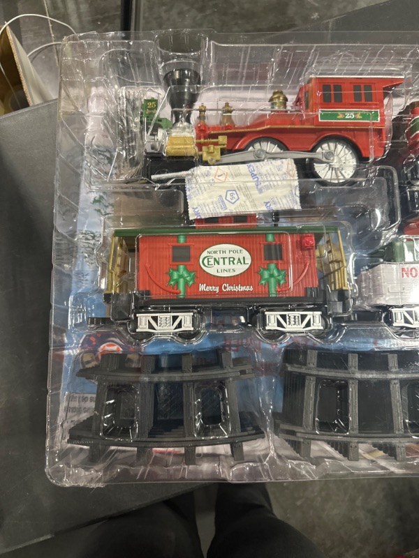 Photo 1 of Lionel North Pole Central Battery-Powered Train Set with Remote + Inner Loop Track Expansion Pack Complete Set + Expansion Track (Inner Loop)