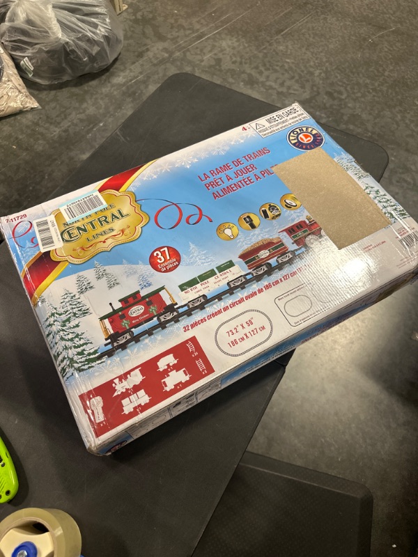 Photo 1 of Lionel North Pole Central Battery-Powered Train Set with Remote + Inner Loop Track Expansion Pack Complete Set + Expansion Track (Inner Loop)