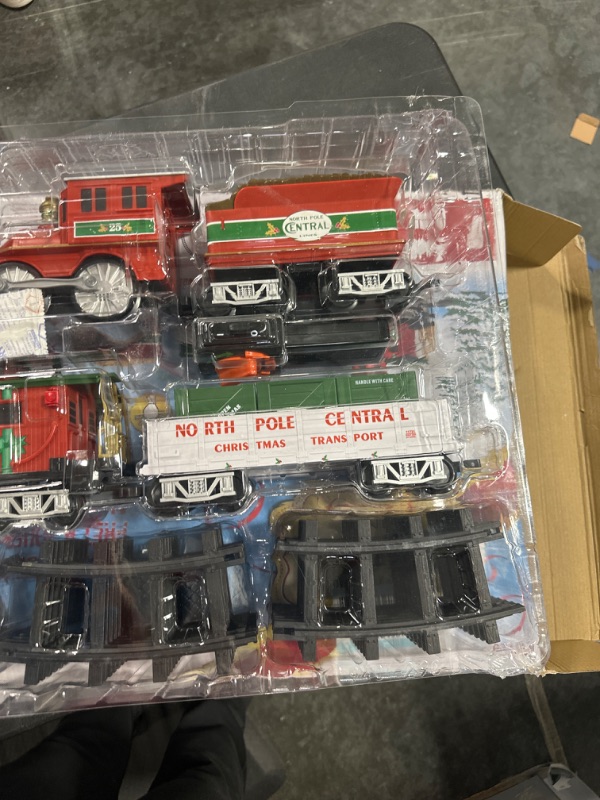 Photo 1 of Lionel North Pole Central Battery-Powered Train Set with Remote + Inner Loop Track Expansion Pack Complete Set + Expansion Track (Inner Loop)