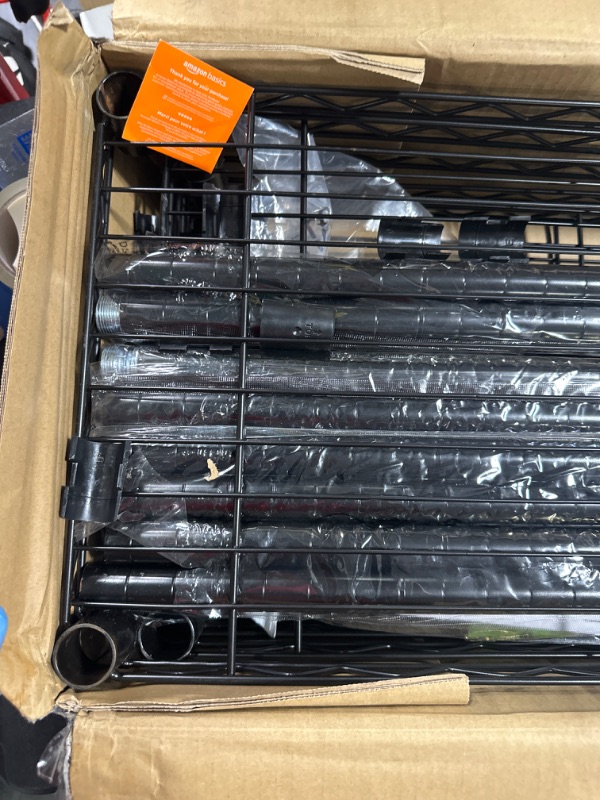 Photo 4 of Amazon Basics 5-Shelf Adjustable, Heavy Duty Storage Shelving Unit (350 lbs loading capacity per shelf), Steel Organizer Wire Rack, Black (36L x 14W x 72H)