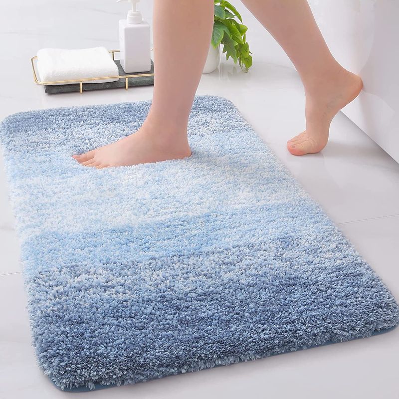 Photo 1 of Arotive Bathroom Rugs Bath Mat, Shaggy Soft and Absorbent Microfiber Bath Rugs, Thick Plush Bath Carpet, Non Slip Machine Wash Dry Bath Mats for Bathroom, Shower and Tub, 24" x 16", Light Blue