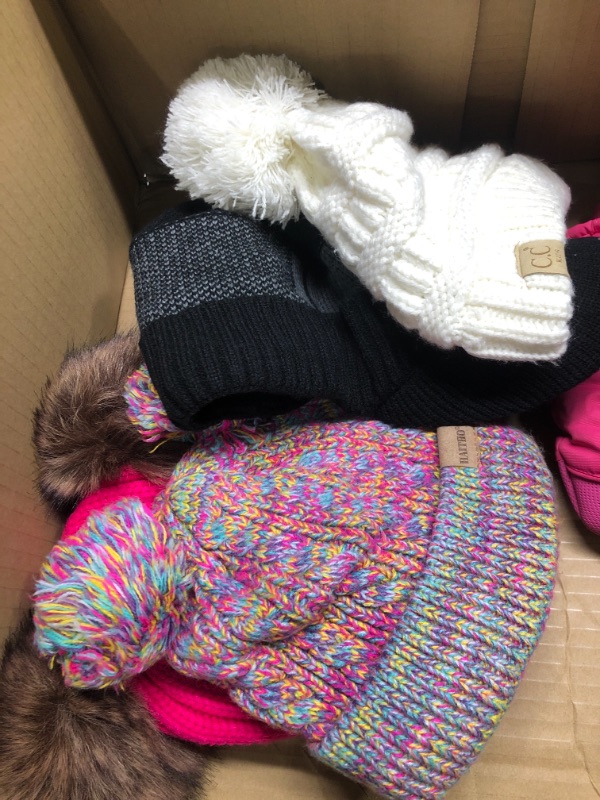 Photo 1 of Children's winter gear 4 small hats, 5 small gloves, 3 small coats, 3 pairs of leggings