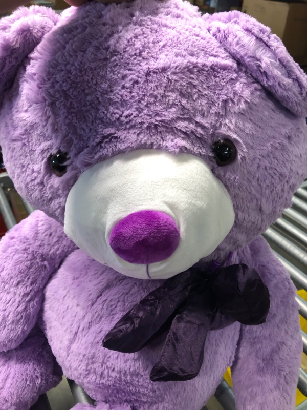 Photo 1 of MorisMos Giant Teddy Bear Stuffed Animals Purple Plush Toy for Girlfriend Kids Christmas Valentine's Day Birthday (Purple, 47 Inches)