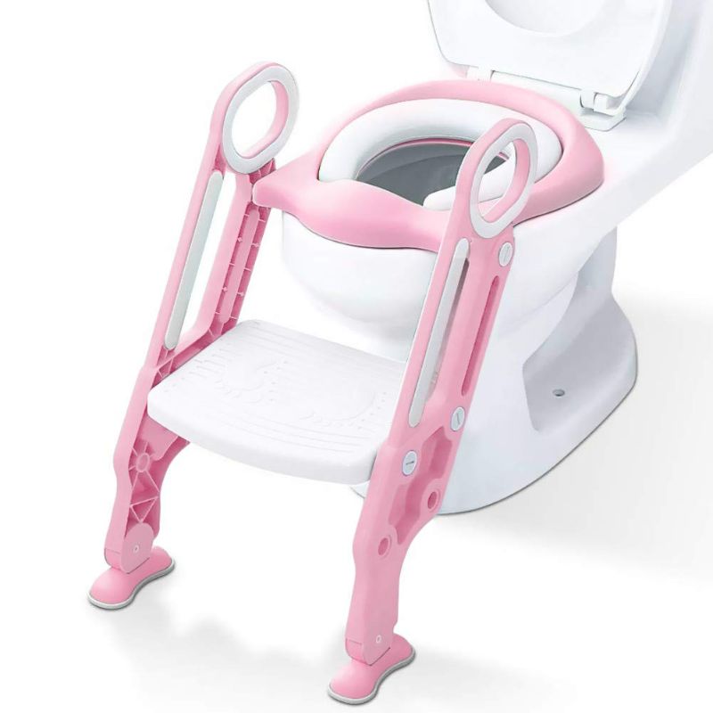 Photo 1 of Potty Training Toilet Seat with Step Stool Ladder for Boys and Girls Baby Toddler Kid Children Toilet Training Seat Chair with Handles Padded Seat Non-Slip Wide Step (Pink White)
