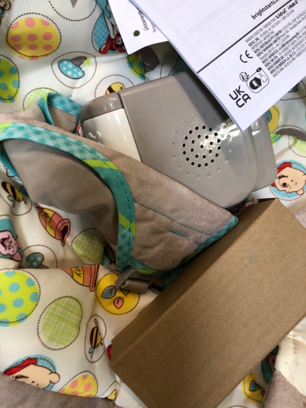 Photo 1 of Bright Starts Winnie the Pooh Dots & Hunny Pots Baby Bouncer with Vibrating Infant Seat, Music & 3 Playtime Toys, 23x19x23 Inch
