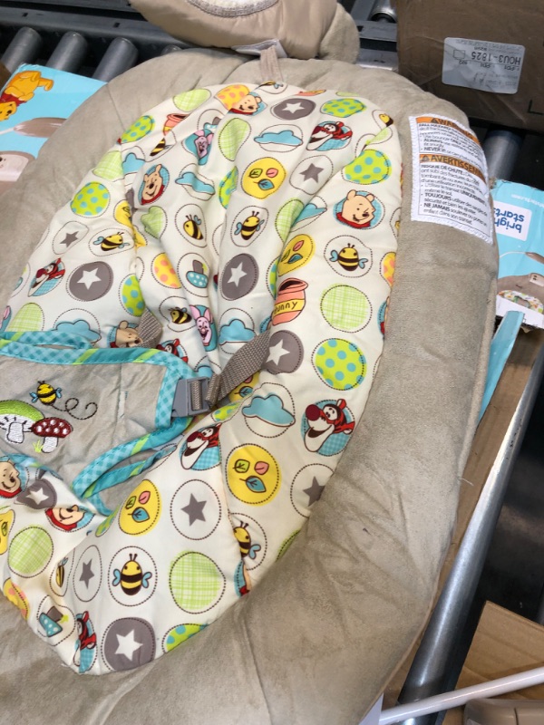 Photo 1 of Bright Starts Winnie the Pooh Dots & Hunny Pots Baby Bouncer with Vibrating Infant Seat, Music & 3 Playtime Toys, 23x19x23 Inch
