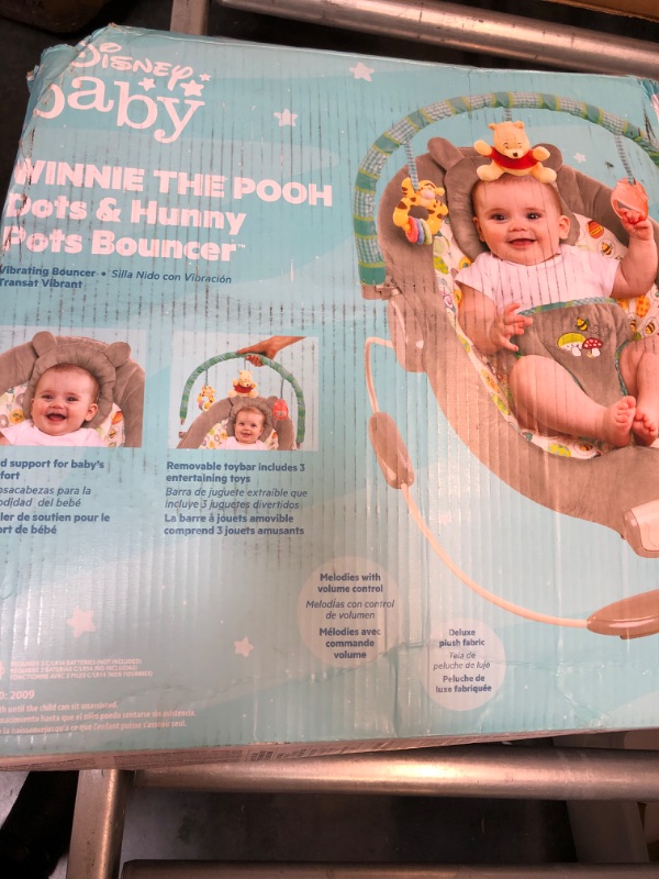 Photo 1 of Bright Starts Winnie the Pooh Dots & Hunny Pots Baby Bouncer with Vibrating Infant Seat, Music & 3 Playtime Toys, 23x19x23 Inch
