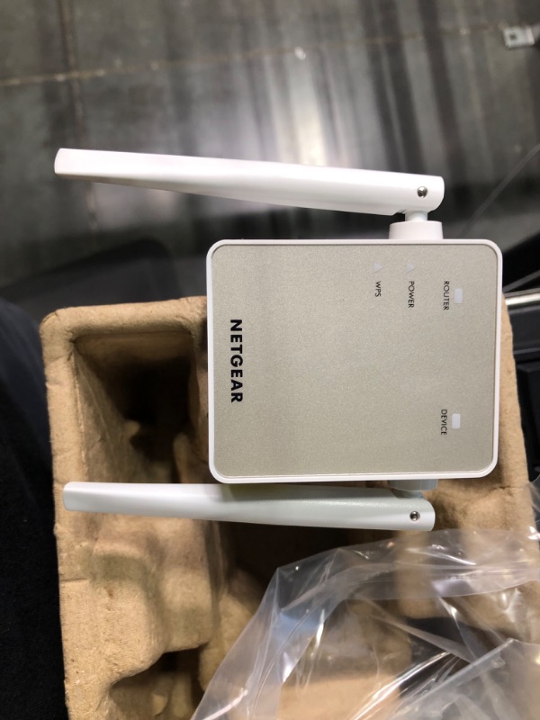 Photo 1 of NETGEAR Wi-Fi Range Extender EX6120 - Coverage Up to 1500 Sq Ft and 25 Devices with AC1200 Dual Band Wireless Signal Booster & Repeater (Up to 1200Mbps Speed), and Compact Wall Plug Design WiFi Extender AC1200