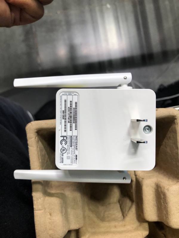 Photo 1 of NETGEAR Wi-Fi Range Extender EX6120 - Coverage Up to 1500 Sq Ft and 25 Devices with AC1200 Dual Band Wireless Signal Booster & Repeater (Up to 1200Mbps Speed), and Compact Wall Plug Design WiFi Extender AC1200