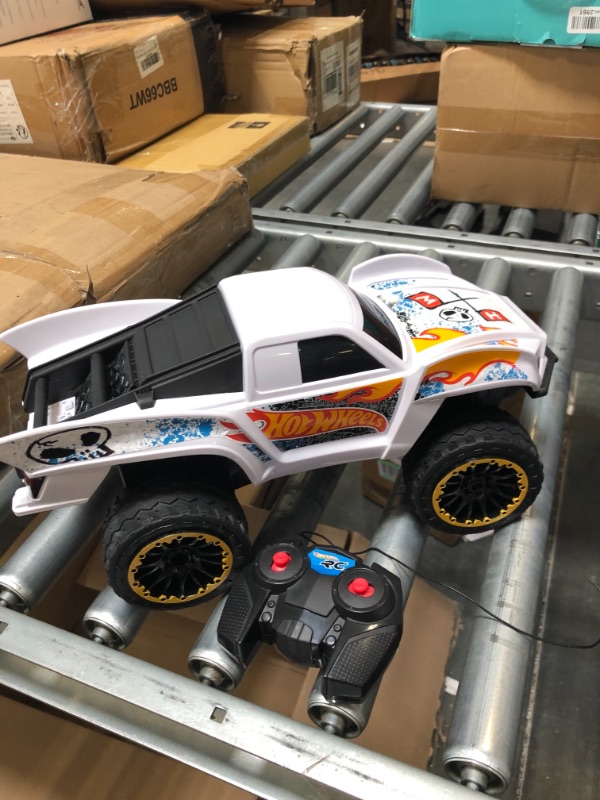 Photo 3 of ?Hot Wheels Remote Control Truck, White Ford RC Vehicle with Full-Function Remote Control, Large Wheels & High-Performance Engine, 2.4 GHz with Range of 65 Feet HW TEAM HW JUMP TRUCK RC