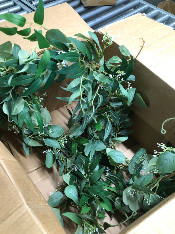 Photo 3 of 5Ft Eucalyptus Garland Lush Silver Dollar Eucalyptus Leaves Boxwood with White Buds Artificial Greenery Garland Fake Vines for Boho Baby Shower Wedding Party Table Mantle Room Home Decorations B-white 1 Pack