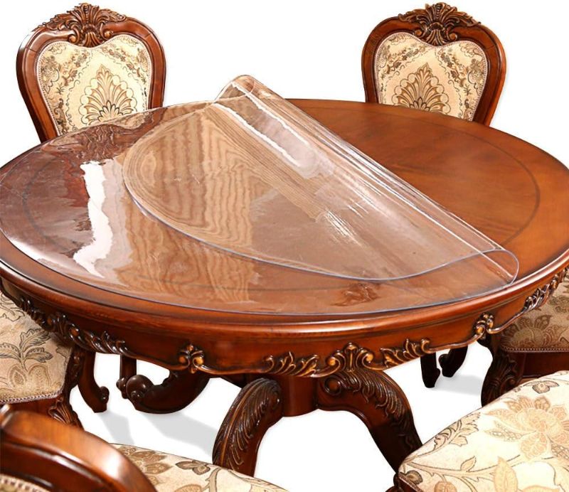 Photo 1 of 44 Inch Diameter Clear Round Plastic Protector Cover Vinyl Tablecloth Clear PVC Placemats Circle Desk Pad Dining Coffee Table Wood Furniture Protector Wipeable Water Resistant Table Runner Protector