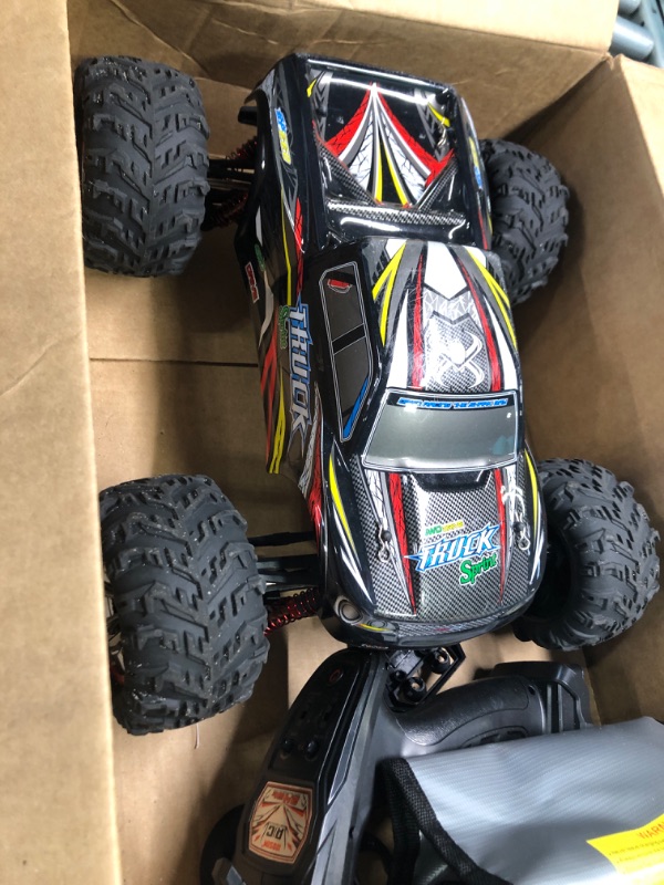 Photo 2 of Blomiky 9125 Over Size 1/10 Scale High Speed 30MPH IPX4 Remote Control Monster Car Truck Bonus Battery 9125 Black Red