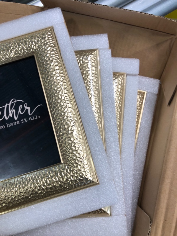 Photo 3 of ArtbyHannah 5x7 Inch 4 Pack Ornate Gold Picture Frames Set with High Definition Glass for Table Top Display and Wall Mount Photo Frame for Wedding or Home Decoration 5x7 Inch Gold-1