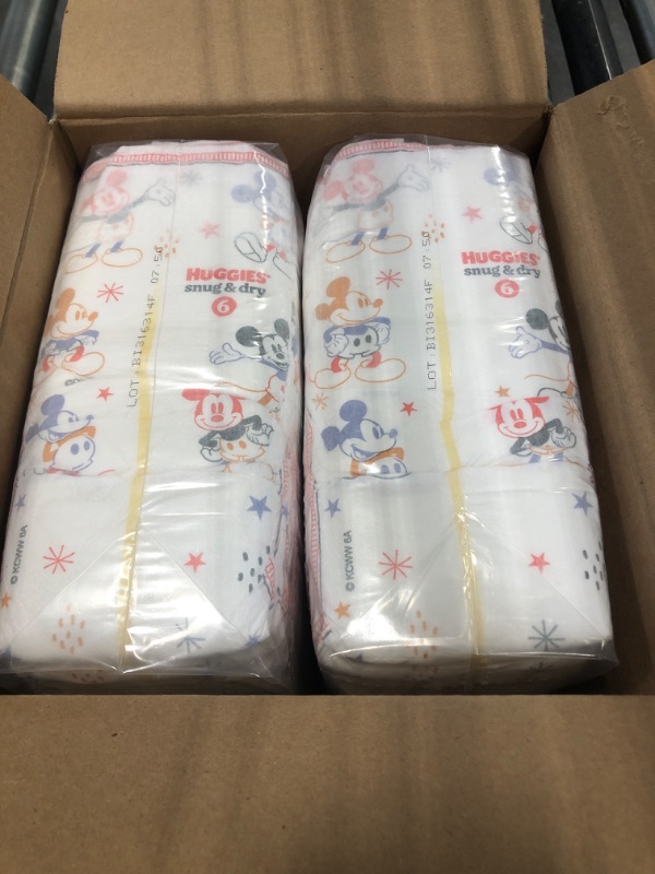 Photo 3 of Huggies Snug & Dry Baby Diapers, Size 6 (35+ lbs), 54 Ct Size 6 (54 Count)