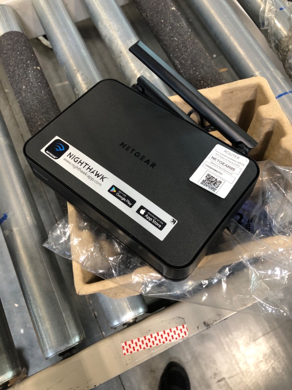 Photo 1 of NETGEAR Dual Band WiFi Router (R6020) – AC750 Wireless Speed (Up to 750Mbps), Coverage up to 750 sq. ft, 10 Devices, 4 x Fast Ethernet Ports
