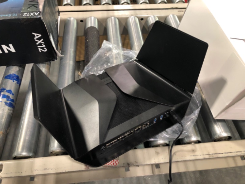 Photo 1 of NETGEAR Nighthawk RAX120 IEEE 802.11ax Ethernet Wireless Router - 2.40 GHz ISM Band - 5 GHz UNII Band - 8 x Antenna(8 x Internal) - 768 MB/s Wireless Speed - 5 x Network Port - 1 x Broadband Port