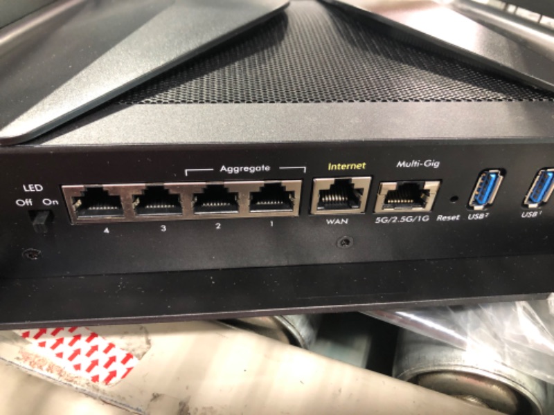 Photo 1 of NETGEAR Nighthawk RAX120 IEEE 802.11ax Ethernet Wireless Router - 2.40 GHz ISM Band - 5 GHz UNII Band - 8 x Antenna(8 x Internal) - 768 MB/s Wireless Speed - 5 x Network Port - 1 x Broadband Port